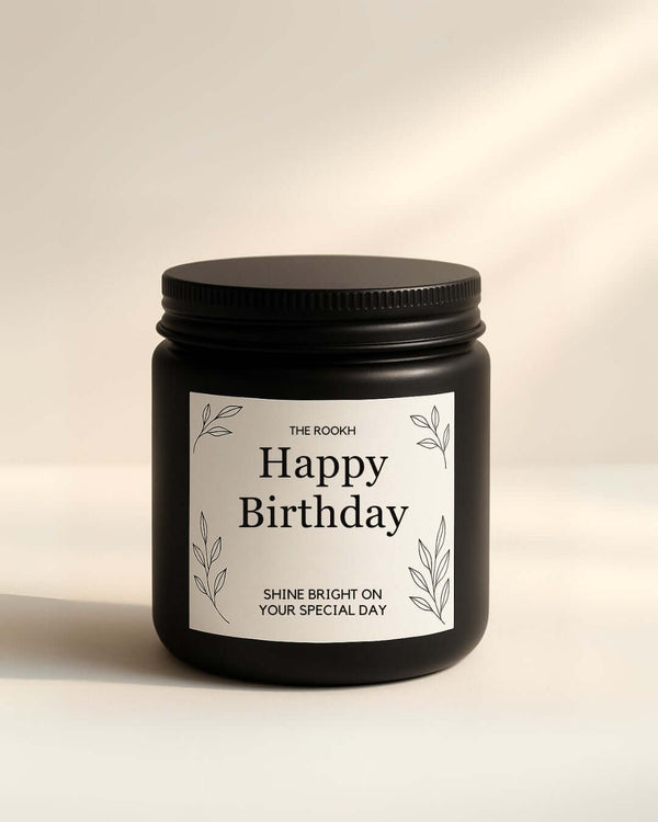 Custom message candle for 30th birthday celebration, set on rustic background.