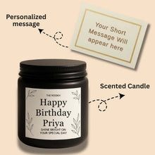 Colorful birthday decor with cake toppers, glitter candles, and gift boxes.