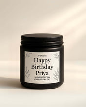 Eco-friendly birthday hamper with soy wax candles and handwritten note.